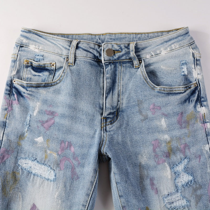 Amiri Paint Splatter Blue Jeans