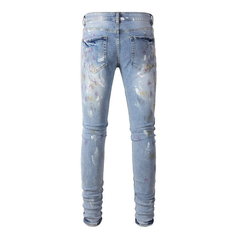 Amiri Paint Splatter Blue Jeans